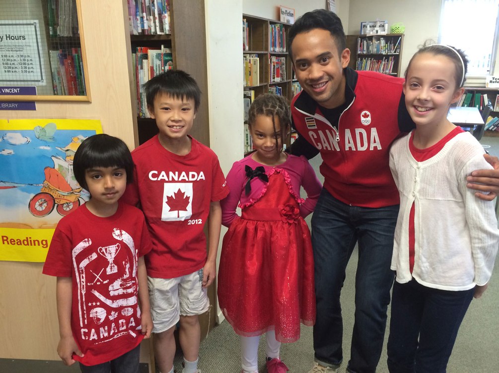 Junio meets with the medal presenters at King Edward PS. The students raised $161 toward the #ThanksGilmore campaign. 