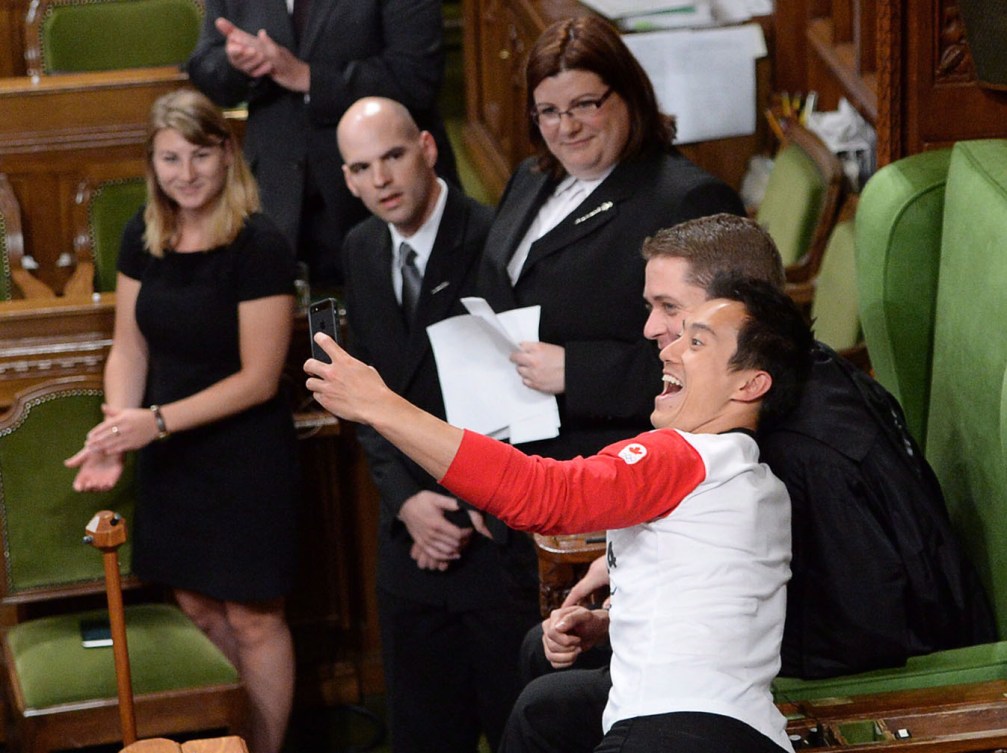 Chan stops to snap a 'selfie'  with House Speaker Andrew Scheer during a trip to Parliament Hill this spring.