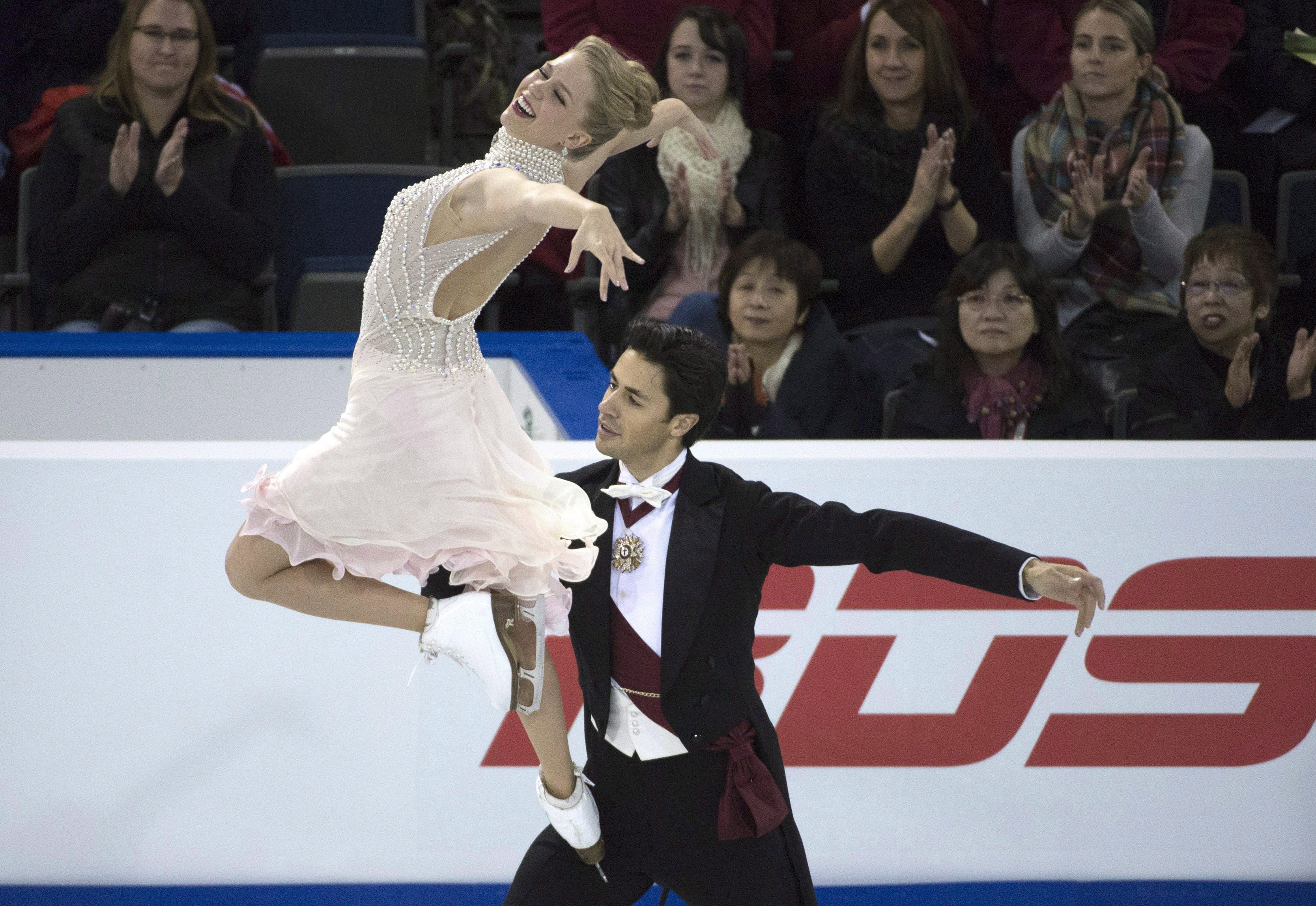 Kaitlyn Weaver et Andrew Poje (Crédit photo: THE CANADIAN PRESS/Jonathan Hayward)