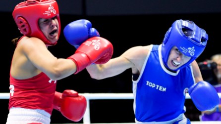 Many Bujold Mandy Bujold, en bleu, lors de son combat contre l'Américaine Marlen Esparza aux Jeux panaméricains de 2015 à Toronto. THE CANADIAN PRESS/Nathan Denette