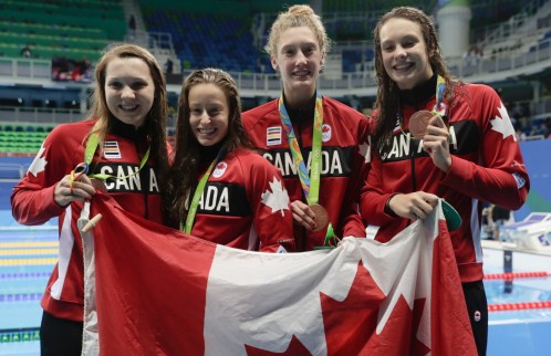 Equipe Canada - natation - Katerine Savard -Taylor Ruck - Brittany MacLean et Penny Oleksiak - Rio 2016 Le quatuor formé de Katerine Savard, Taylor Ruck, Brittany MacLean et Penny Oleksiak obtient le bronze au relais féminin 4x200 m aux Jeux olympiques de Rio, le 10 août 2016. (COC / Steve Boudreau)