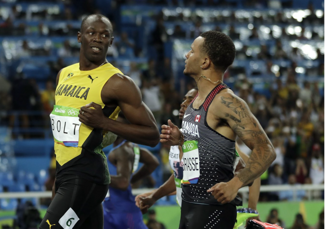 Usain Bolt et Andre De Grasse lors de la demi-finale du 100 m aux Jeux olympiques, le 14 août 2016