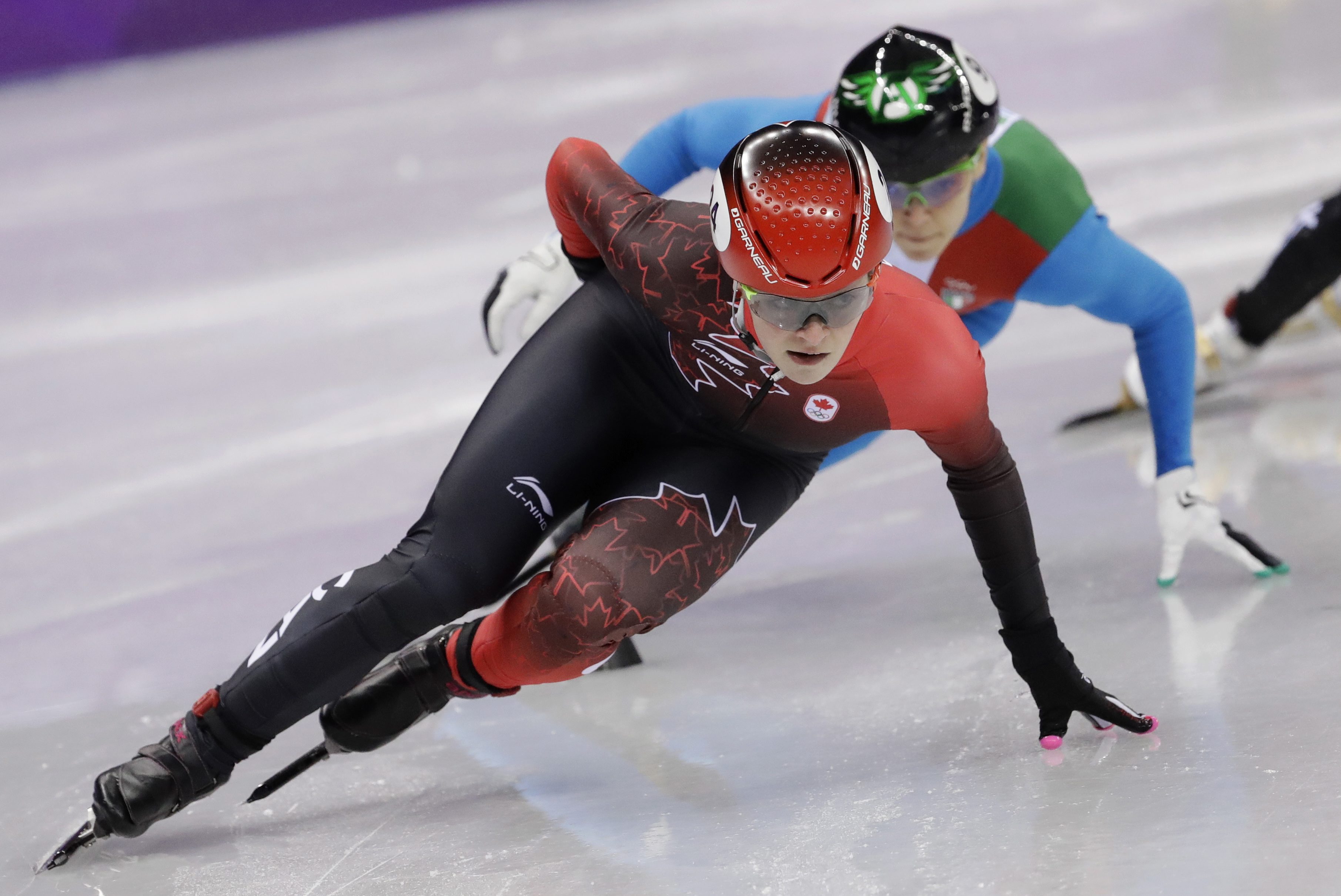 Kim Boutin à la demi-finale de l'épreuve du 1000 m en patinage de vitesse sur courte piste, le 22 février 2018. AP Photo/Bernat Armangue