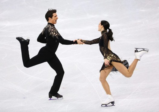 Tessa Virtue et Scott Moir patinent leur programme court de danse sur glace aux Jeux olympiques de PyeongChang, le 19 février 2018. Photo COC/Vaughn Ridley