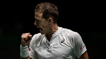 Vasek Pospisil célèbre un point.