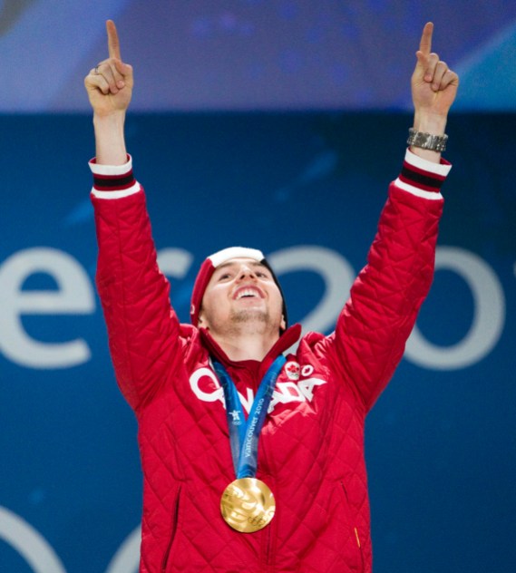 Freestyle Skiing Canada's Alexandre Bilodeau celebrates his gold medal, Canada's first of the games, during a medal ceremony at the 2010 Winter Olympic Games in Vancouver, Monday, Feb. 15, 2010.THE CANADIAN PRESS/Jonathan Hayward