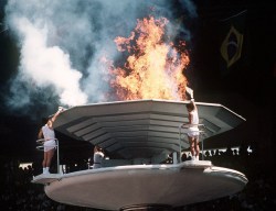 Torch bearers light the Olympic Flame during opening ceremonies at the 1988 Olympic game