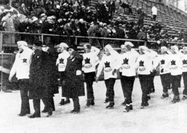 Team Canada participates in the opening ceremonies at the 1932 Lake Placid Olympics