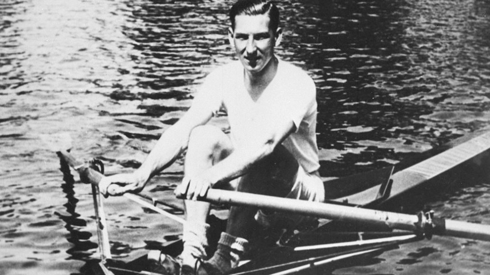 Jack Guest rowing in a single