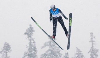 Canadian ski jumper Mackenzie Boyd-Clowes, from Calgary, sails through a snow squall at Whistler Olympic Park in Whistler, B.C., during official training on Thursday, February 11, 2010 at the 2010 Vancouver Olympic Winter Games. THE CANADIAN PRESS/Andrew Vaughan