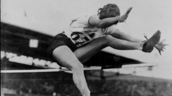 Ethel jumping over a hurdle