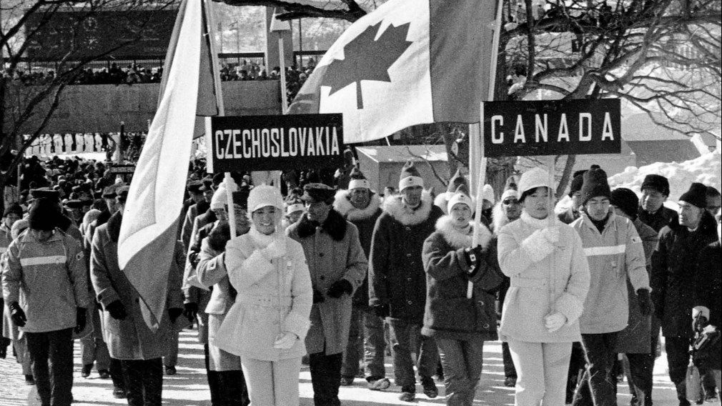 Canada's Karen Magnussen carries the Canadian flag during the opening ceremony of the Sapporo 1972 Olympic Winter Games.