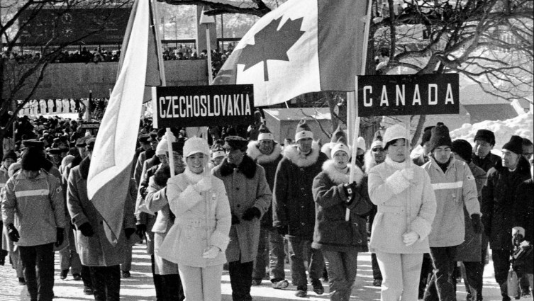 Canada's Karen Magnussen carries the Canadian flag during the opening ceremony of the Sapporo 1972 Olympic Winter Games.