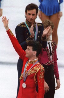 Brian Orser waves as Brian Boitano applauds the silver medallist at Calgary 1988.