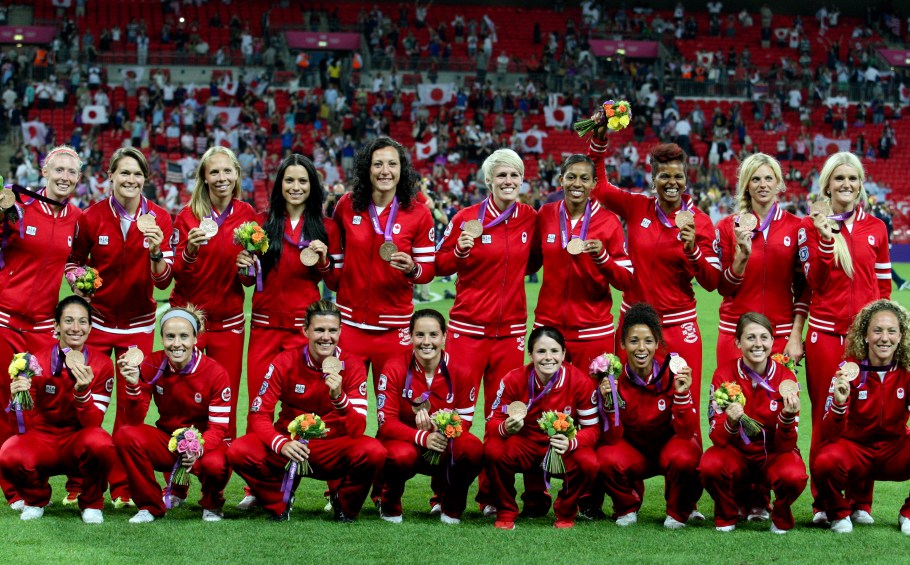 Canada's women's football team receive their bronze medals at Wembly Stadium at the 2012 London Olympics, Thursday, Aug. 9, 2012. THE CANADIAN PRESS/HO, COC - Mike Ridewood