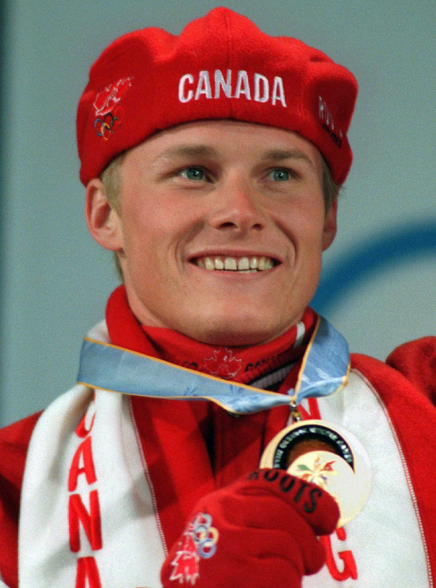NAGANO, JAPAN, Feb. 8--GOLD--Ross Rebagliati of Whistler, B.C. holds h is gold medal after placing first in the Olympic Giant Slalom Snowboarding competition in Nagano, Japan, Sunday. (CP PHOTO)1998(stf-Frank Gunn)fxc