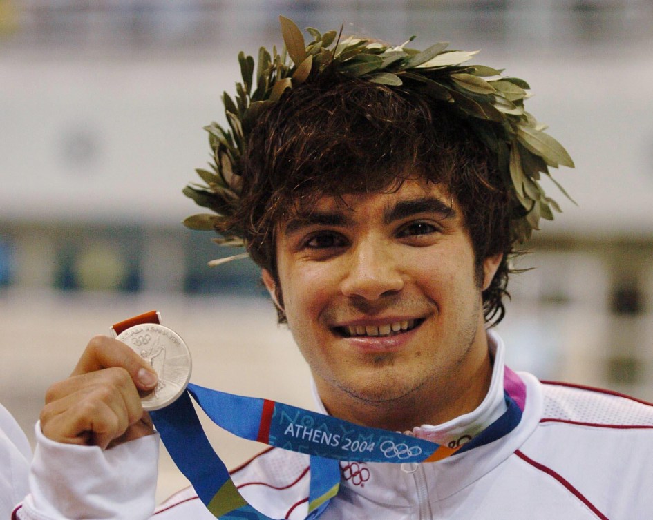 ALEXANDRE DESPATIE posing with his medal