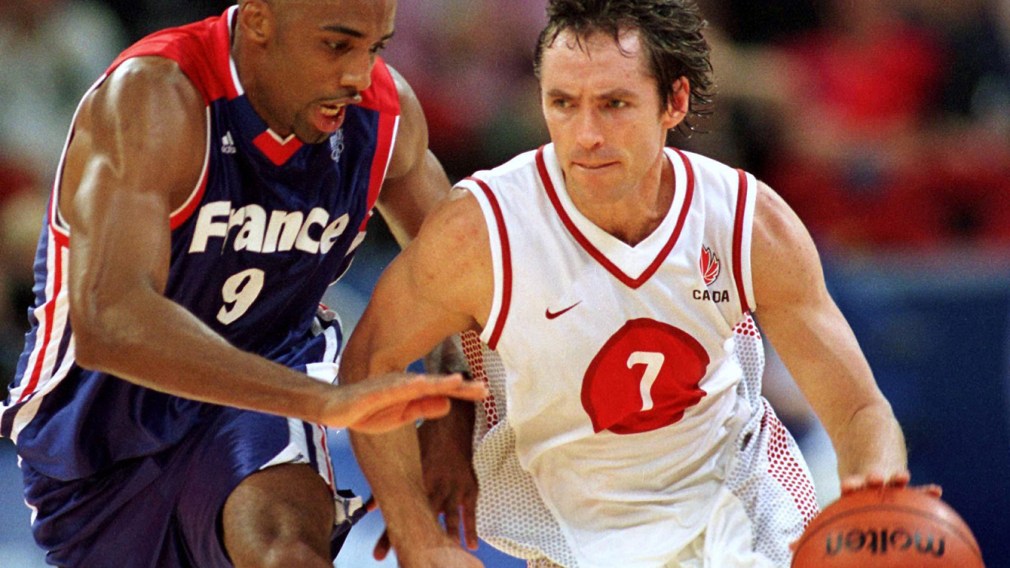 Steve Nash tries to move the ball against Makan Dioumassi of France