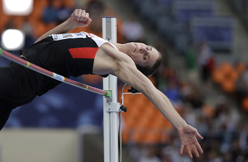Canada's Derek Drouin competes in the men's high jump final at the World Athletics Championships 2013