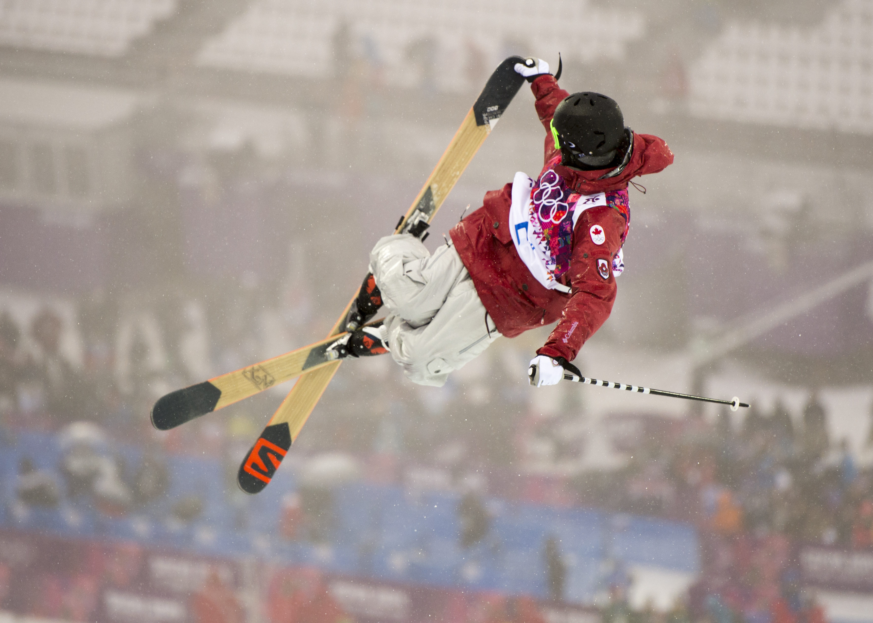 An athlete competing in ski halfpipe