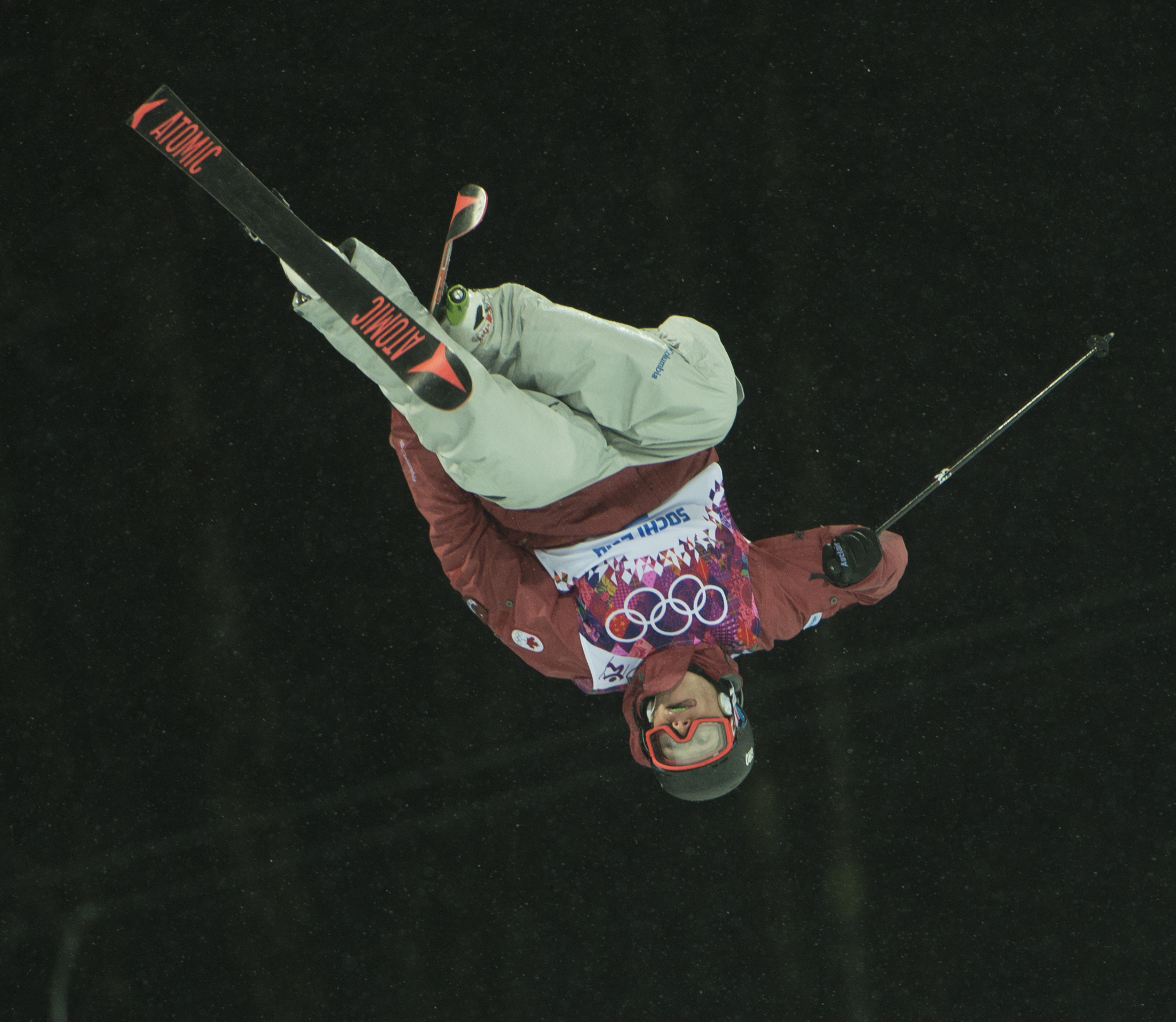 An athlete competing in ski halfpipe
