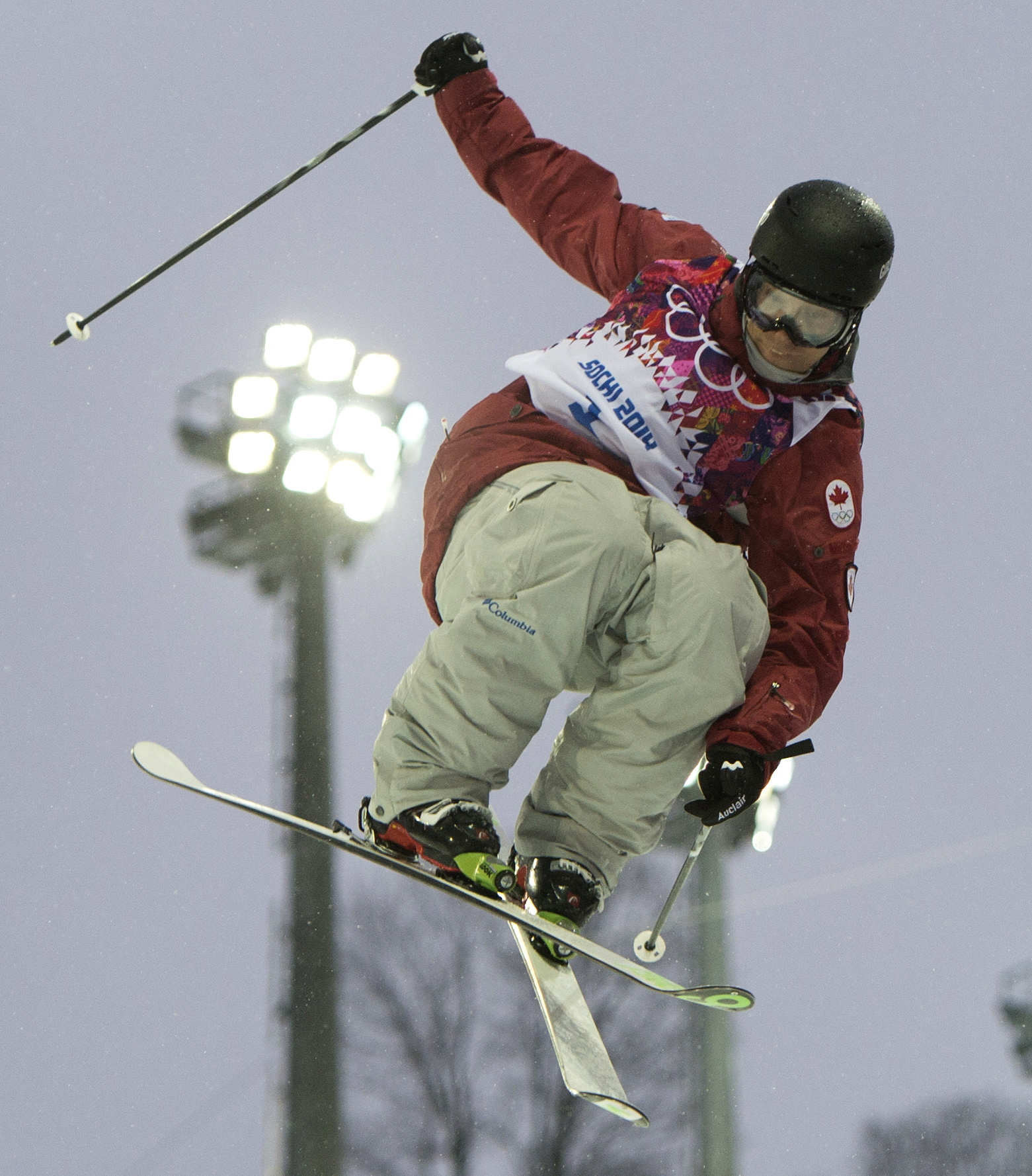An athlete competing in ski halfpipe