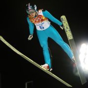 An athlete competing in ski jump