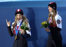 Justine Dufour-Lapointe receives her gold medal and her sister Chloe a silver