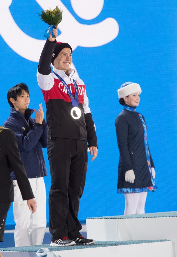 Patrick Chan receives his silver medal