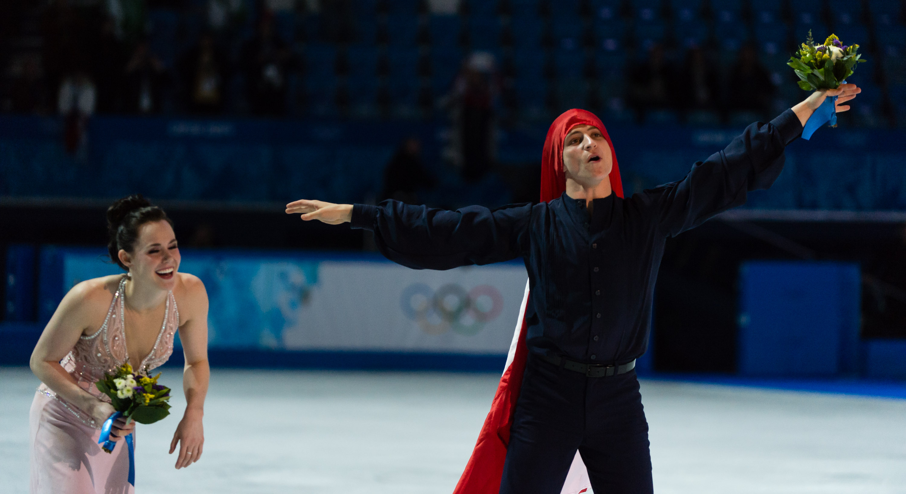 Scott celebrating with the Canadian flag over his head