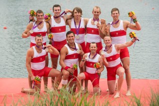 Canada's men's eight rowing team members hold their silver medals following their win at the 2012 London Olympics, on August 1, 2012. Back row from left to right: Douglas Csima; Conlin McCabe; Malcome Howard; Andrew Byrnes and Jeremiah Brown. Front row: Gabriel Bergen; Rob Gibson; Brian Price and Will Crothers. THE CANADIAN PRESS/HO, COC - Jason Ransom