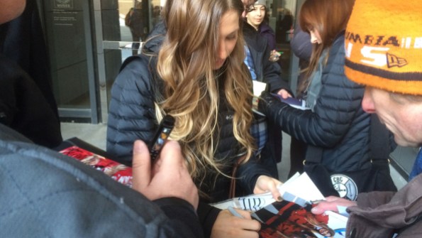 Autograph seekers await Chloé and the group as they exit the CBC building.