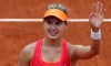 Bouchard fights back to earn French Open semifinal spot