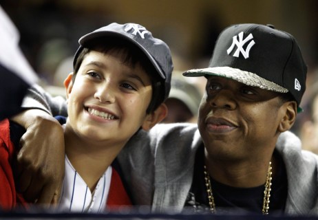 Jay-Z poses with a fan. Photo: CP