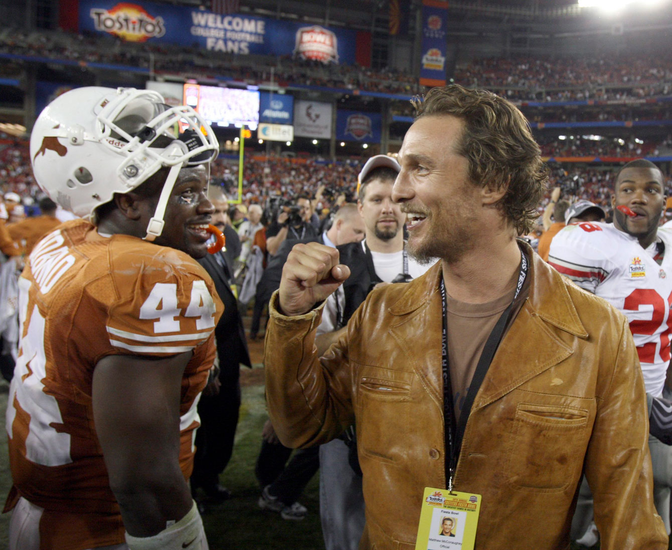 McConaughey celebrates the Longhorns' 2009 Fiesta Bowl win with linebacker Rashad Bobino. Photo: CP