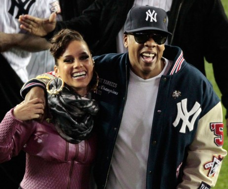 Jay-Z and Alicia Keys waiting to perform during a 2009 World Series game. Photo: CP