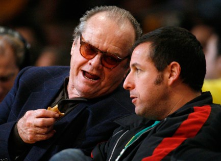 Jack Nicholson and Adam Sandler discuss life during a Lakers game. Photo: CP