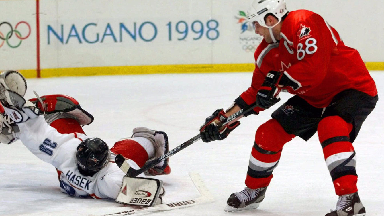 Hall of Famer Dominik Hasek of the Czech Republic stops Eric Lindros in the 1998 Olympic men's ice hockey semifinal. Hasek stopped all five shots in the shootout helping to beat Canada 2-1 en route to Olympic gold.
