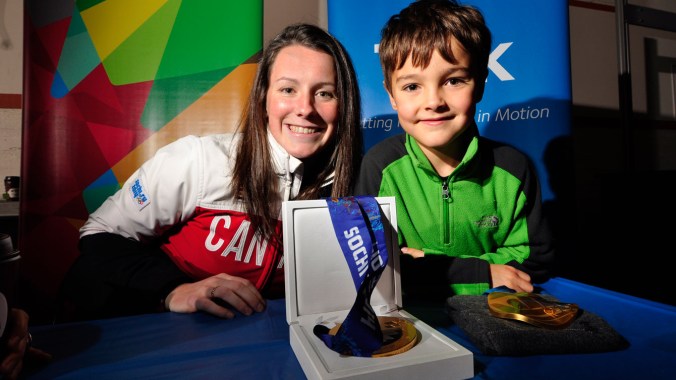 Catherine Ward A young Smoke Eaters fan with Catherine Ward at the Smoke Eaters game in Trail, BC.