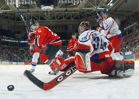 Nigel Dawes puts a puck past the Czech goalie during their semifinal (Photo: CP)