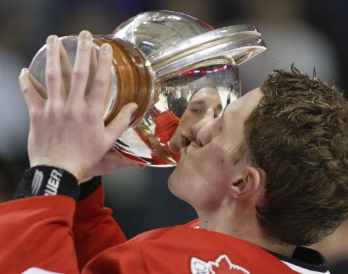DION PHANEUF Dion Phaneuf celebrates with the trophy after their gold medal win at the 2005 World Juniors (Photo: CP)