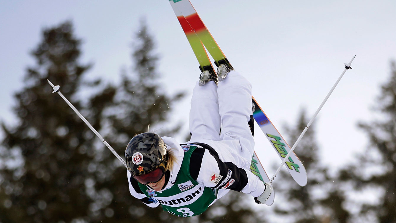 Justine Dufour-Lapointe flies through the air during one of her moguls runs at Deer Valley. 