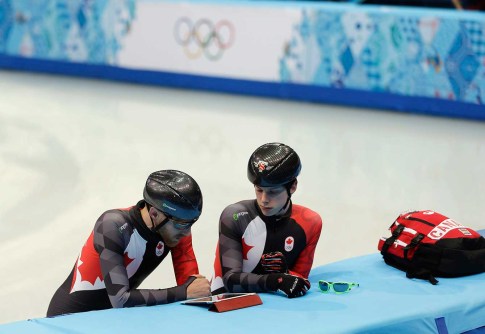 Charle Cournoyer (R) won the 500m bronze medal in short track.