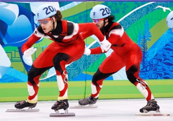 One short track speed skater pushed another in a relay