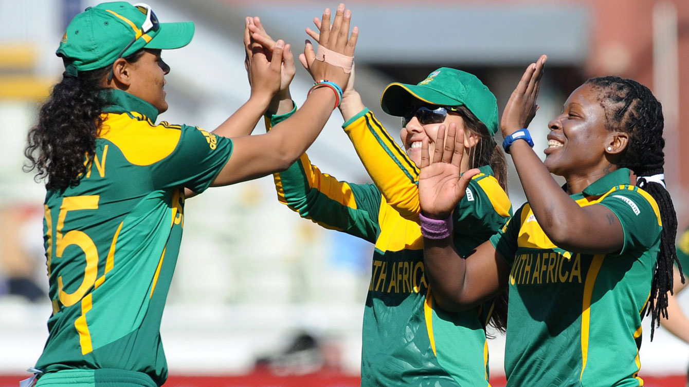 Players on South African women's cricket team celebrate an out against England during T20 play. The 20-overs version of cricket is significantly shorter than traditional cricket. Women's cricket governing bodies are eager to see the sport included in the Olympics. 
