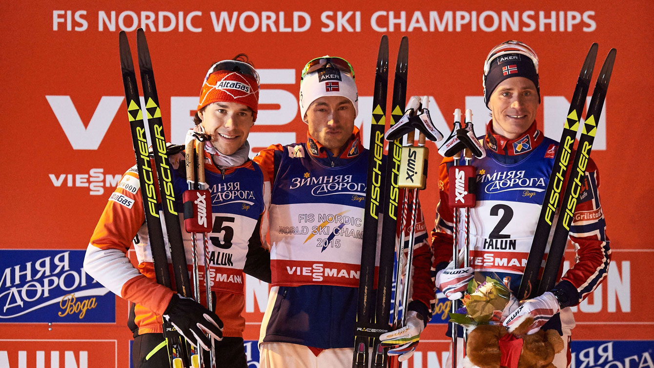 Alex Harvey (left) on the 2015 World Championship podium in Falun, Sweden for silver in men's sprint. 