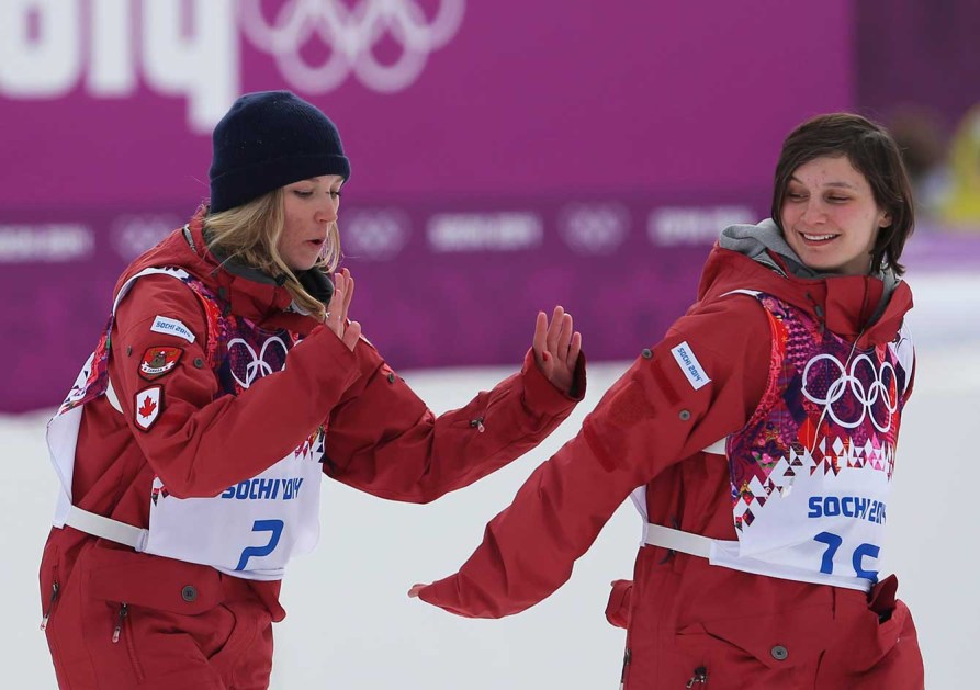 Dara Howell (L) and Kim Lamarre (R) on their way to the flower ceremony in Sochi.