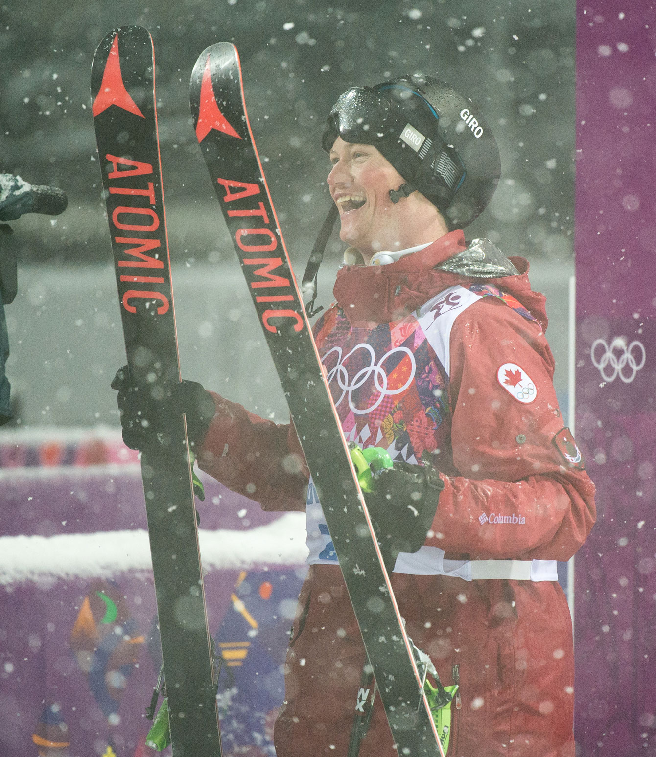 Mike Riddle is all smiles upon learning that he's an Olympic medallist.