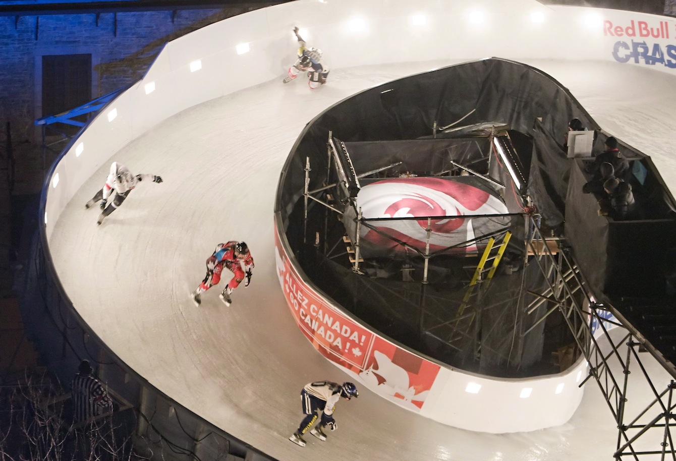 Every ice cross course features unique obstacles, such as this looping turn. (Photo: Canadian Press)