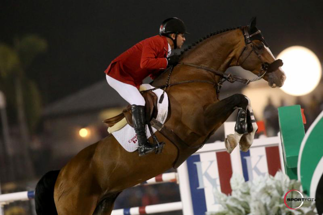 2008 Olympic champion Eric Lamaze rides Coco Bongo at the $100,000 Nations' Cup in Wellington, FL. Feb 27, 2015